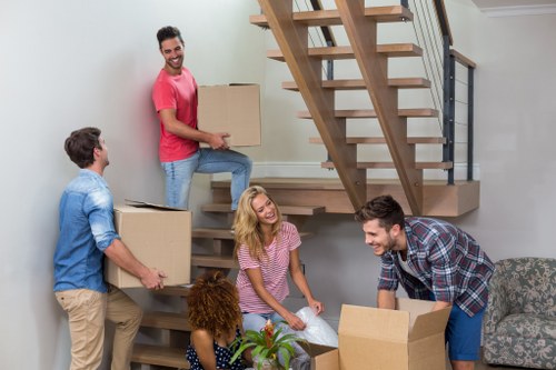 Professional removal services in Queenspark with moving truck and packed boxes