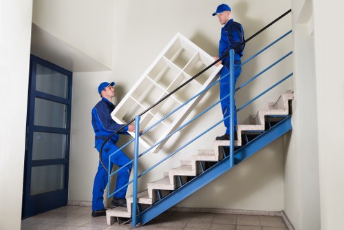 Worker using protective equipment during a property move