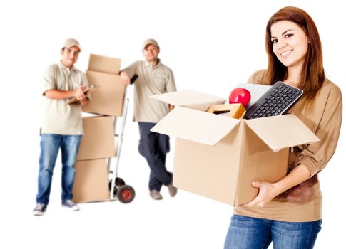 Unpacking boxes and arranging belongings in a new Queenspark home