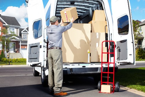 Queenspark office relocation team preparing desks and equipment for transport