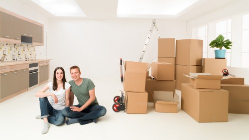 Local Queenspark moving van loaded with boxes and household items