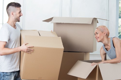 Organised moving boxes labeled for a Queenspark relocation