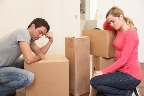 Urgent office move with removal workers transporting equipment