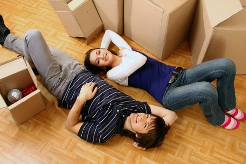 Professional furniture removal service handling sofas and tables in Queenspark