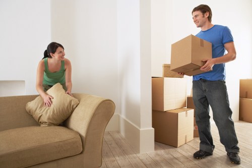 Queenspark moving truck loaded with furniture and boxes