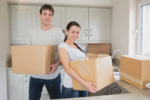 Local Queenspark movers preparing furniture for safe transport